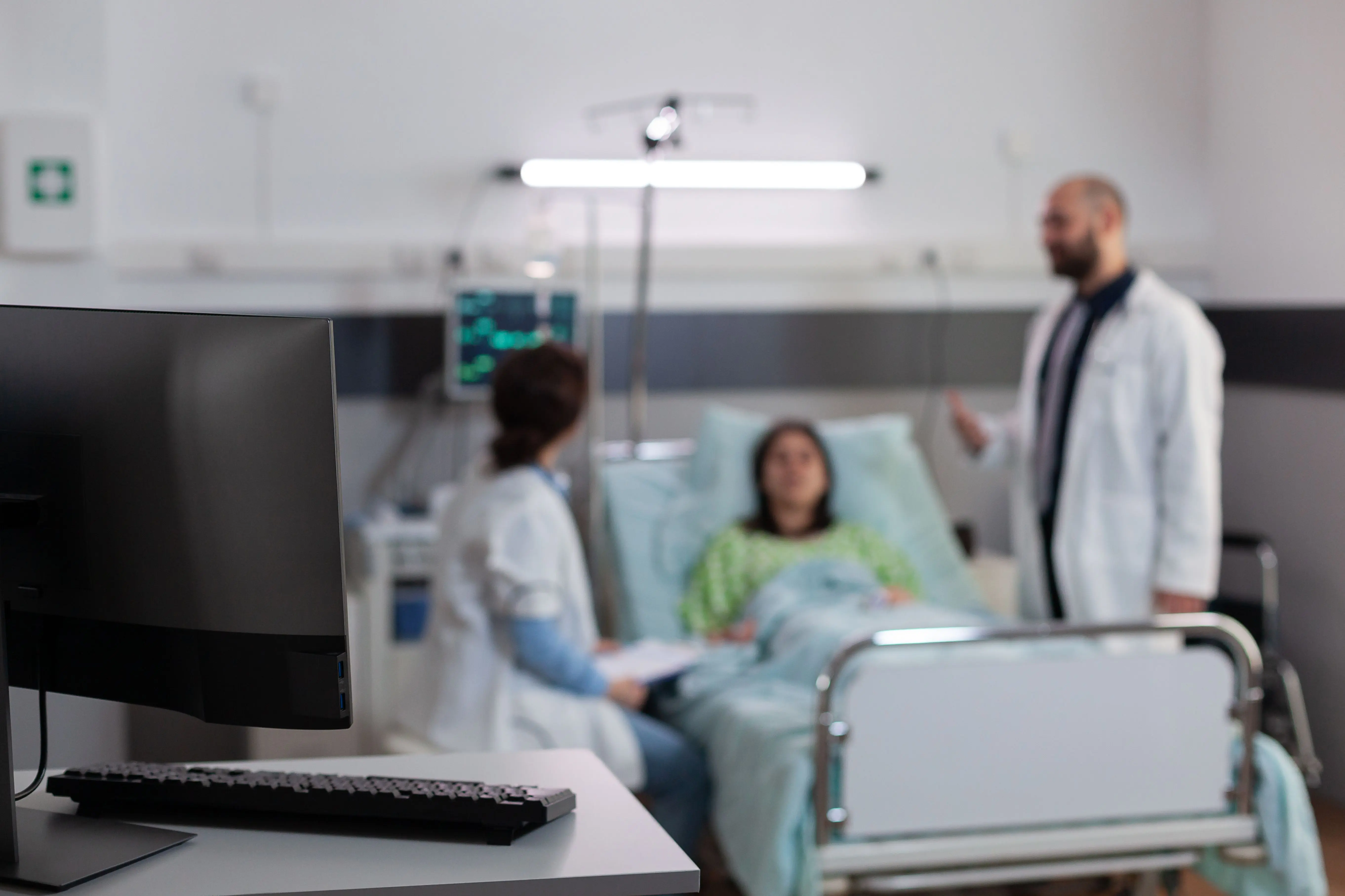 sick-patient-resting-bed-wearing-nasal-oxygen-tube-while-discussing-with-doctors-medical-treatmen.jpg